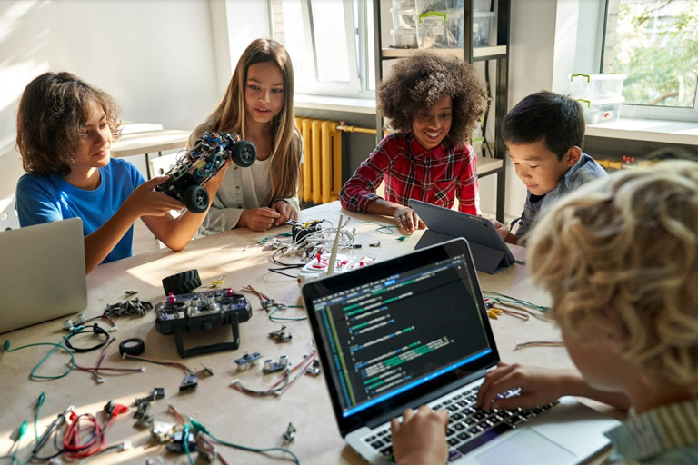 A group of STEM students working together on a project